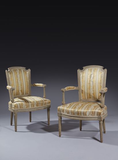 Pair of molded and painted beech armchairs...
