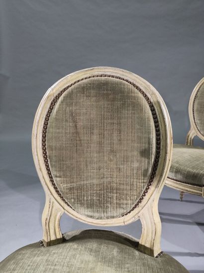 Three molded and painted wood chairs with...