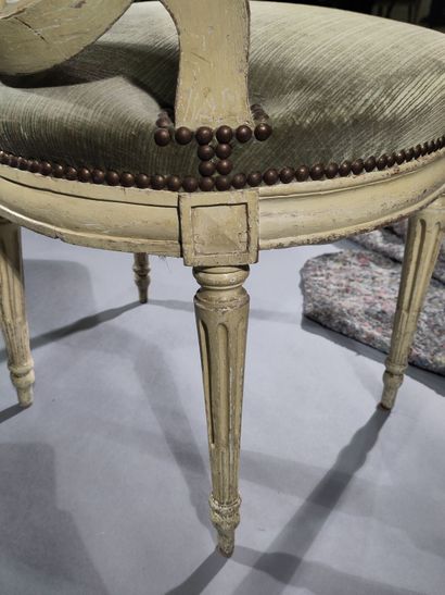Three molded and painted wood chairs with...