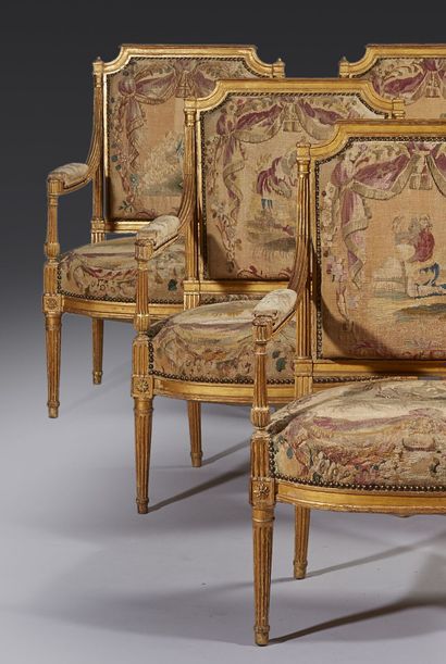 Suite of six armchairs and one sofa in gilded...