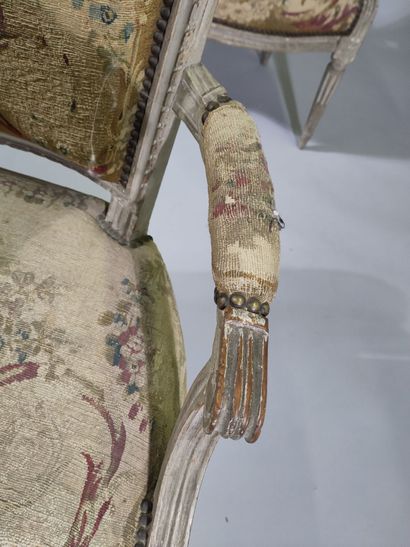 Six armchairs and a sofa in molded, carved...