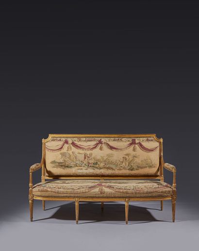 Suite of six armchairs and one sofa in gilded...