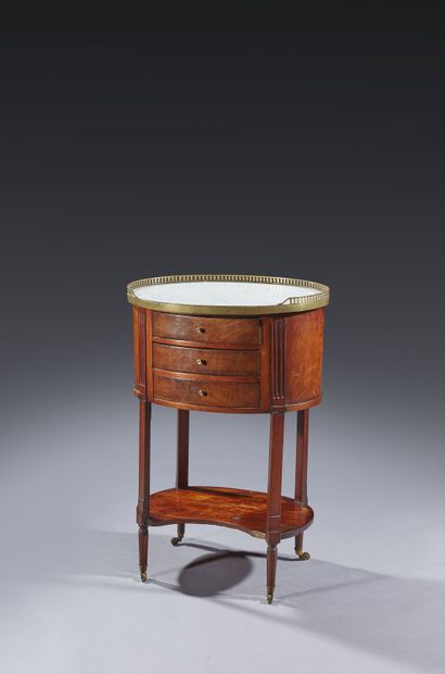 Mahogany and mahogany veneer oval coffee...