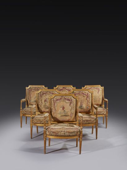 Suite of six armchairs and one sofa in gilded...