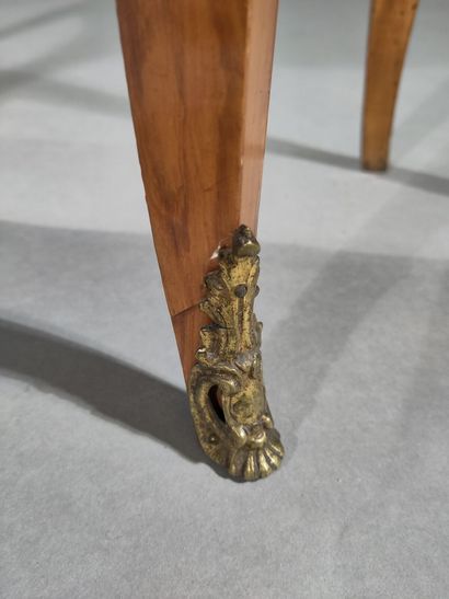 A half-moon-shaped rosewood and satinwood...