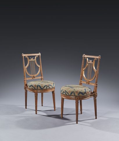 Pair of molded and carved beech chairs, with...