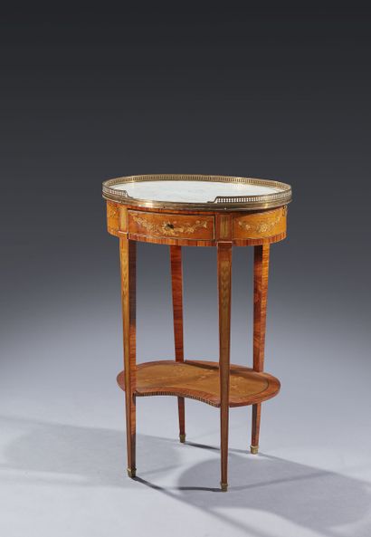 Small oval writing table, in marquetry of...