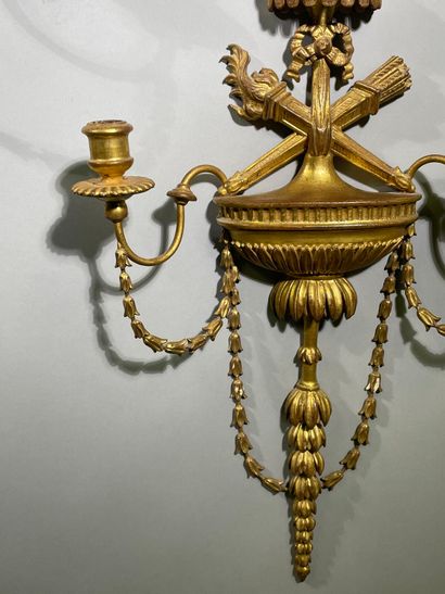 Paire d'appliques en bois doré à deux bras...
