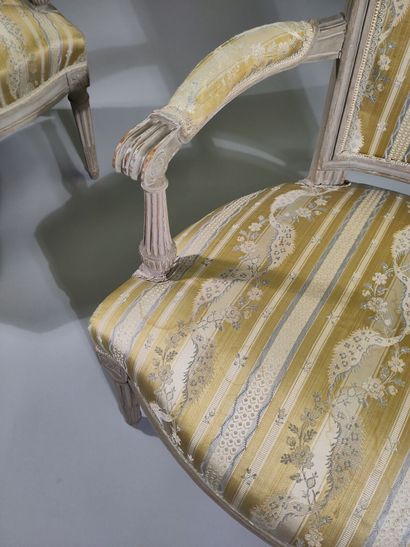 Pair of molded and painted beech armchairs...
