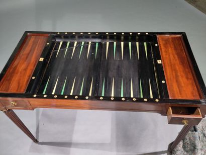 Mahogany and ebony game table, opening with...