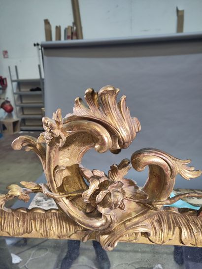 Large molded, carved and gilded wood mirror...