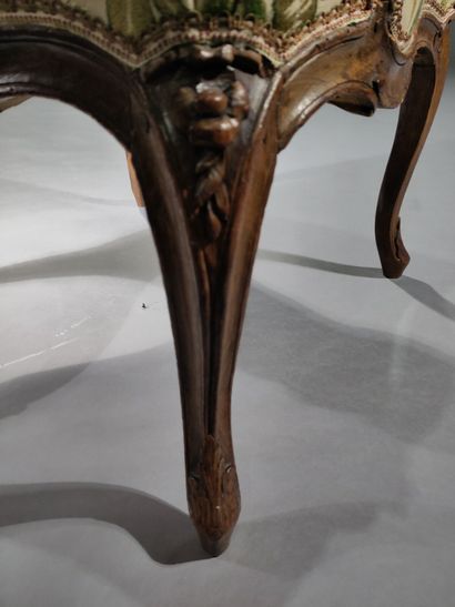 Flat-backed armchair in molded and carved...