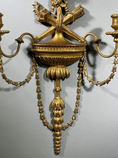 Paire d'appliques en bois doré à deux bras...
