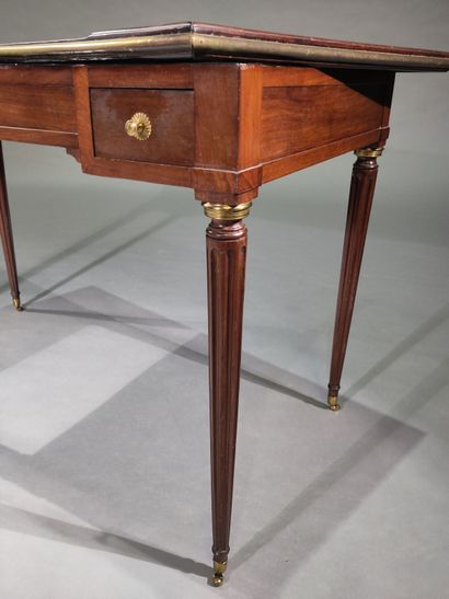 Mahogany and ebony game table, opening with...