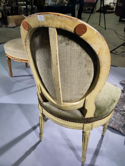 Three molded and painted wood chairs with...