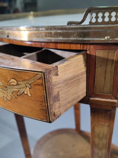 Small oval writing table, in marquetry of...