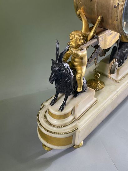Bacchante clock in patinated bronze, gilt...