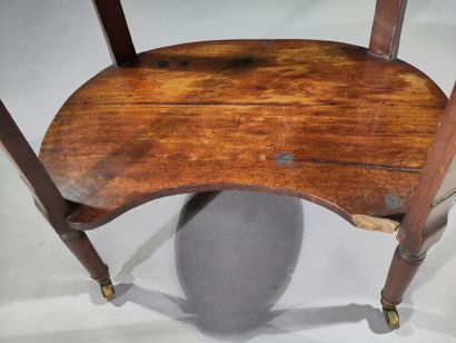 Oval molded mahogany table opening to three...