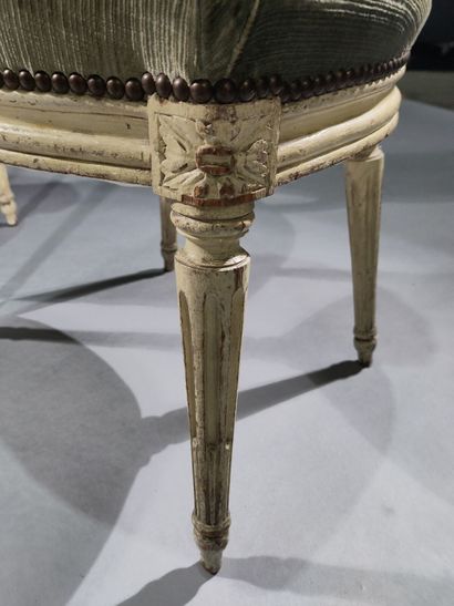 Three molded and painted wood chairs with...
