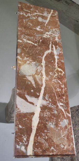 Small wall bracket resting on a reconstituted...