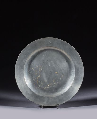 Large circular pewter dish, engraved W W...
