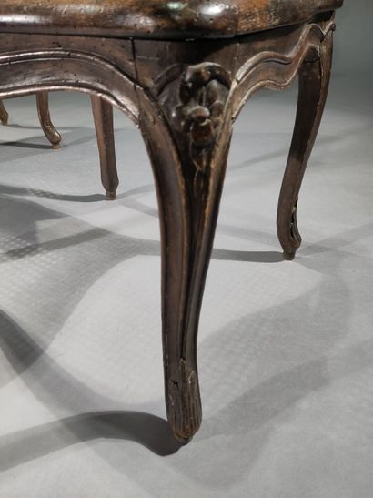 Pair of caned armchairs in molded and carved...