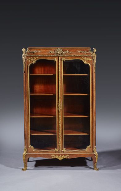 Bibliothèque en bois de placage à décor en...