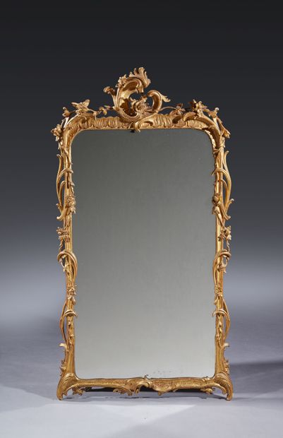 Large molded, carved and gilded wood mirror...