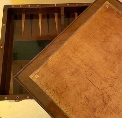 Solid mahogany game table, the scalloped...
