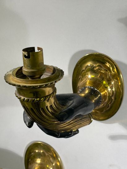 Suite of five one-arm sconces in bronze and...