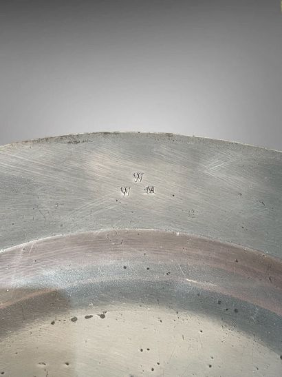 Large circular pewter dish, engraved W W...
