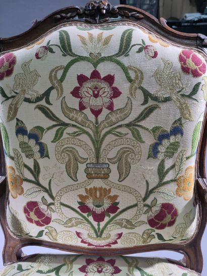 Flat-backed armchair in molded and carved...