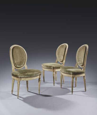 Three molded and painted wood chairs with...