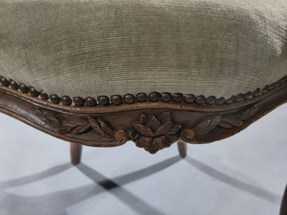 Four molded and carved beech armchairs, the...