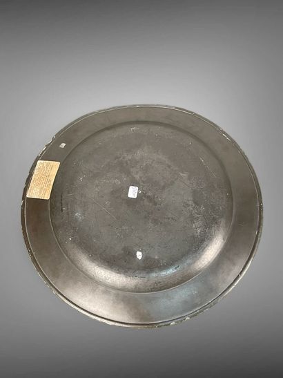 Large circular pewter dish, engraved W W...