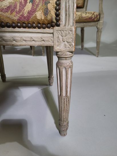 Six armchairs and a sofa in molded, carved...