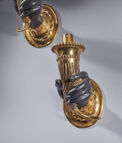 Suite of five one-arm sconces in bronze and...