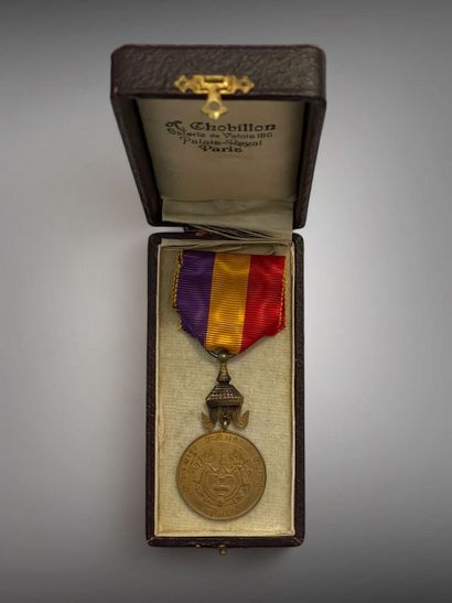 Quatre médailles : 
- Médaille de Bravoure,...