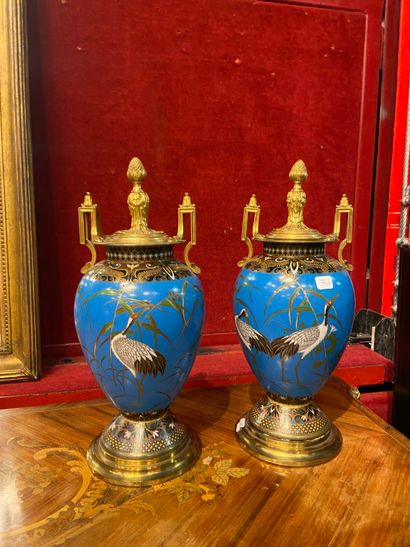 Dans le goût de BARBEDIENNE
Paire de vases...