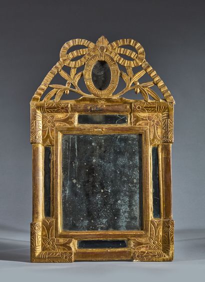 Petit miroir à parecloses à cadre en bois...