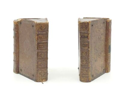 Deux reliures formant serre-livres.
(Usures...