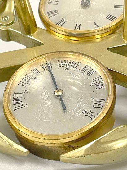 HERMÈS
Gilt metal clock and barometer with...