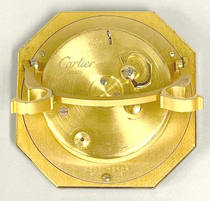 CARTIER
Hexagonal travel alarm clock in burgundy-enameled...