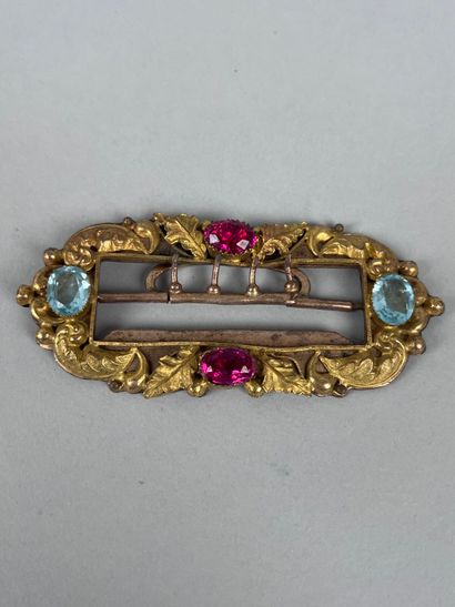 Gilt metal belt buckle decorated with stylized...