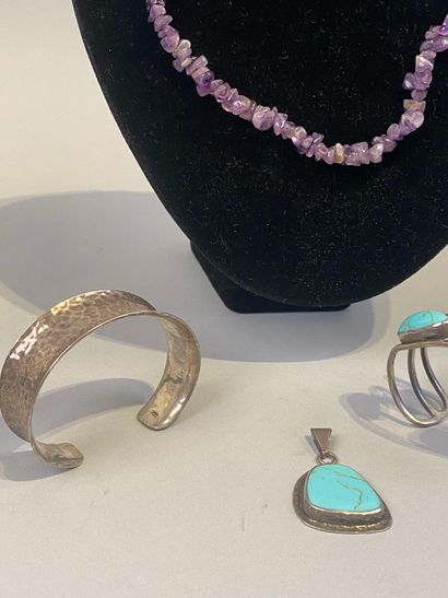 Set includes a hammered beaded bracelet,...