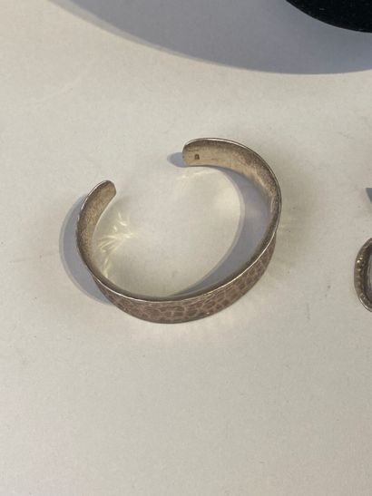 Set includes a hammered beaded bracelet,...