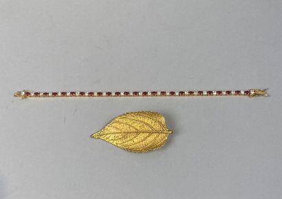 Set includes a gilded metal leaf brooch and...