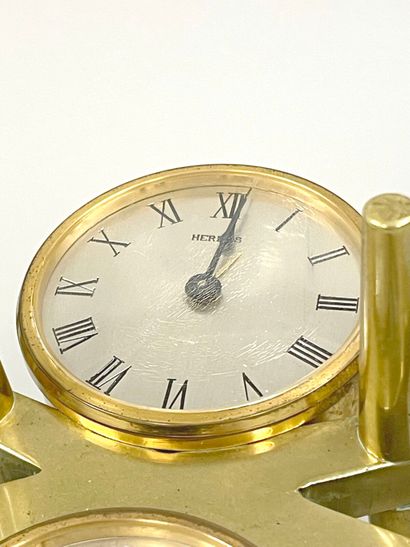 HERMÈS
Gilt metal clock and barometer with...