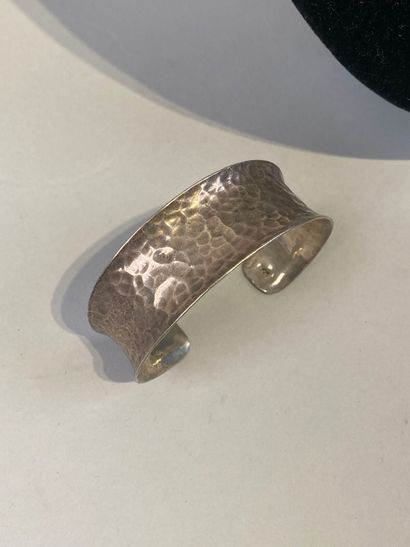 Set includes a hammered beaded bracelet,...