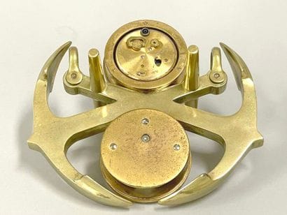 HERMÈS
Gilt metal clock and barometer with...